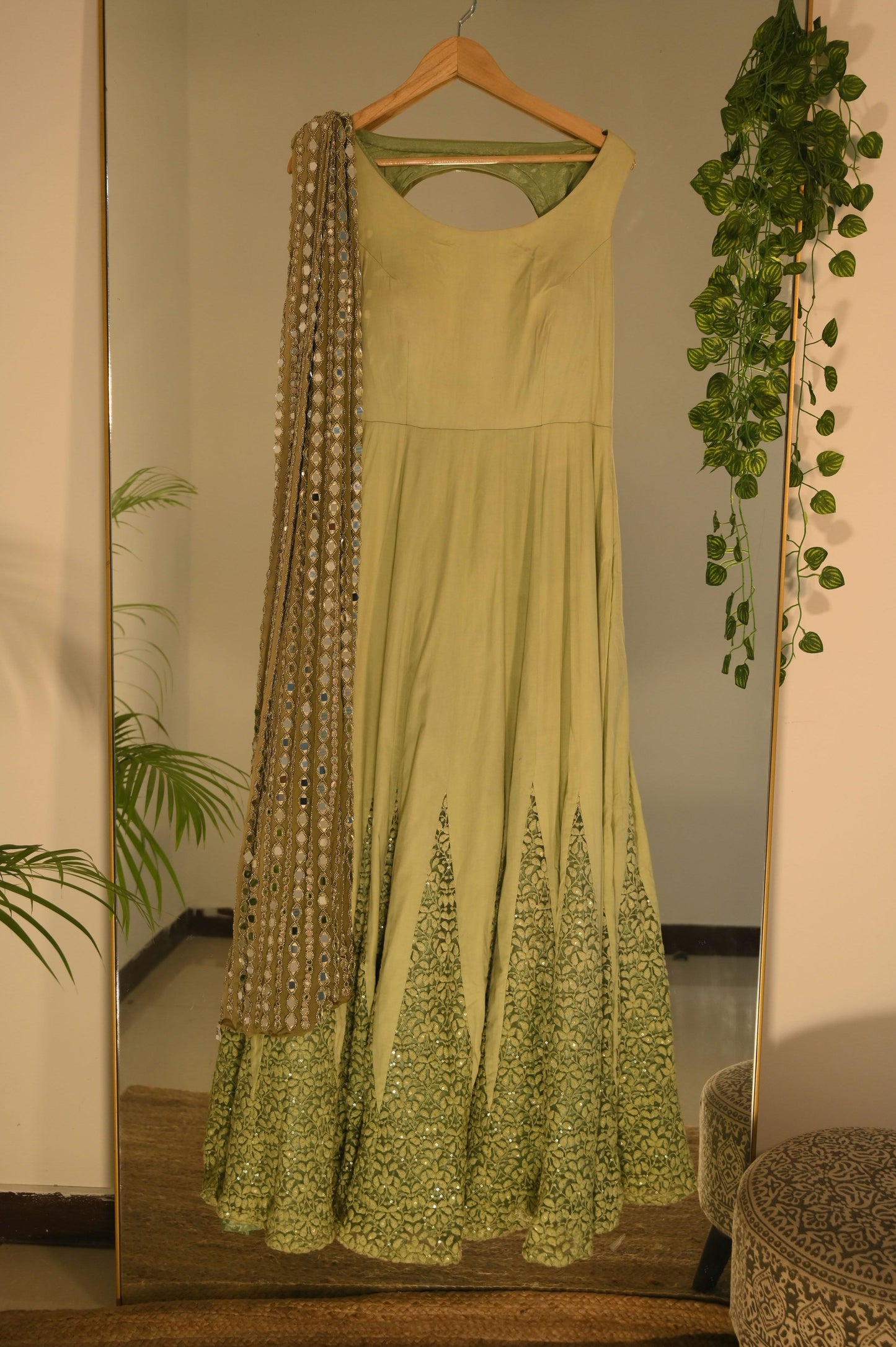 Pastel green kalidar gown with heavy mirror work dupatta
