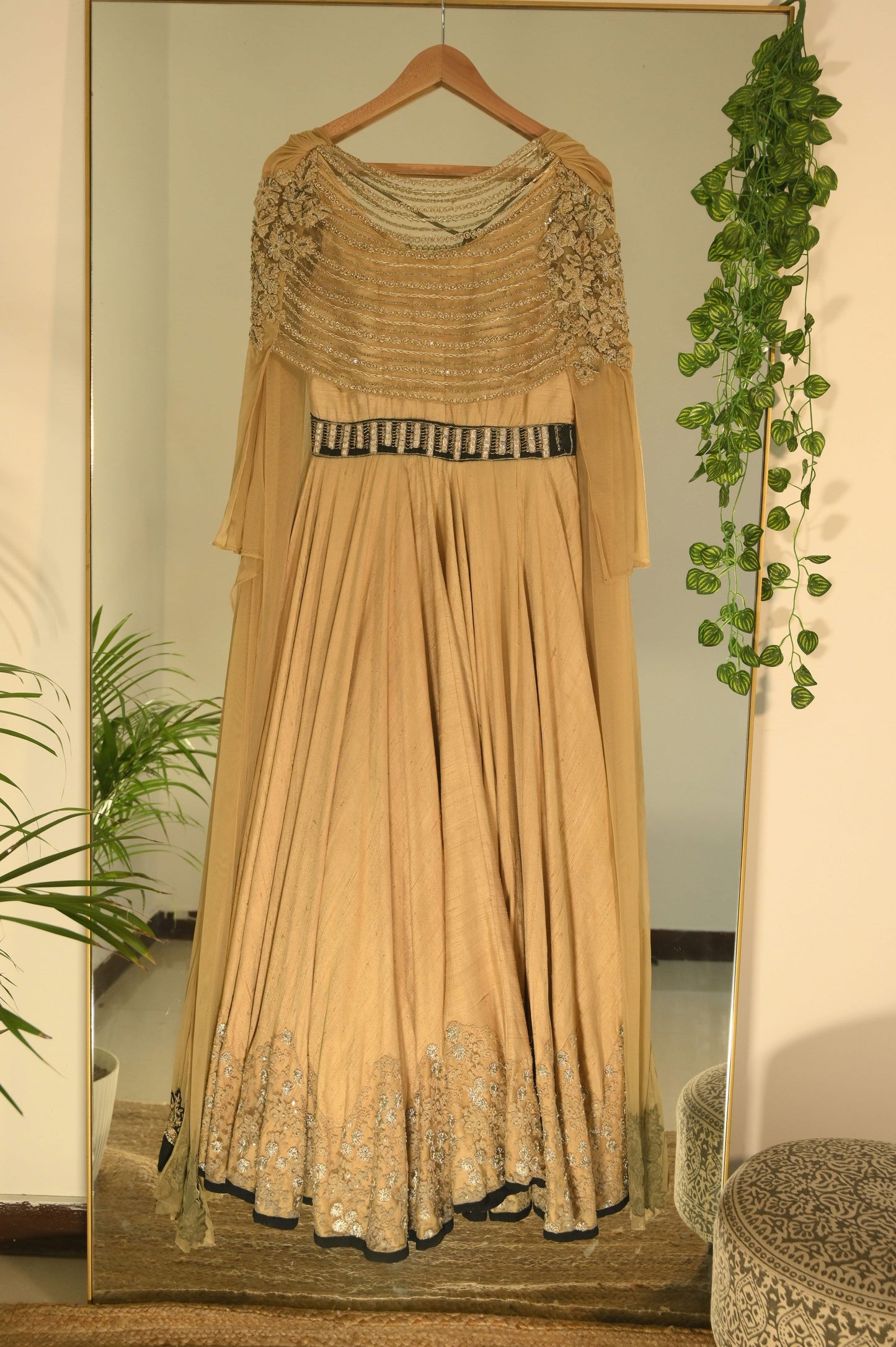 Ocher gown with drape detailing