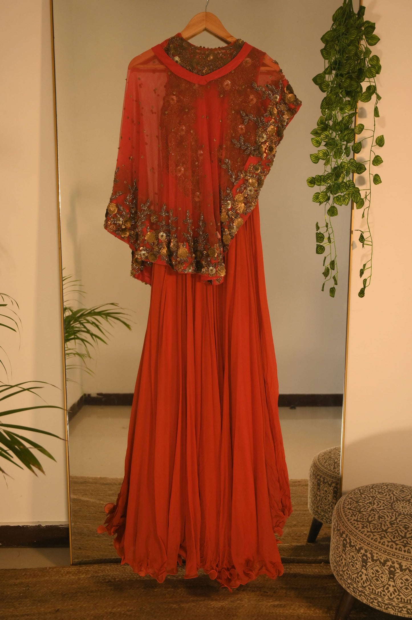 Heavily embellished red gown