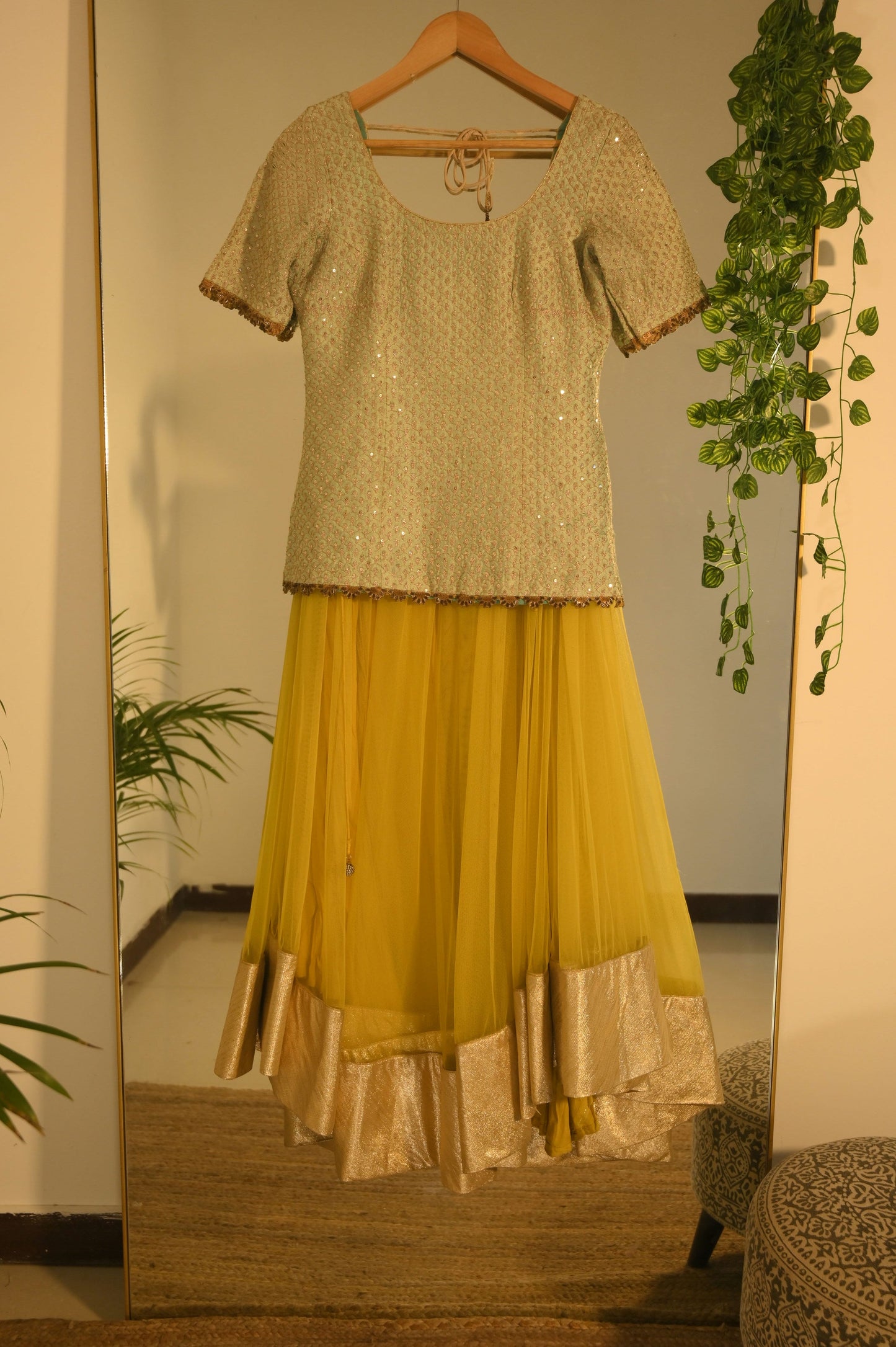 Green zari kurta with yellow lehenga