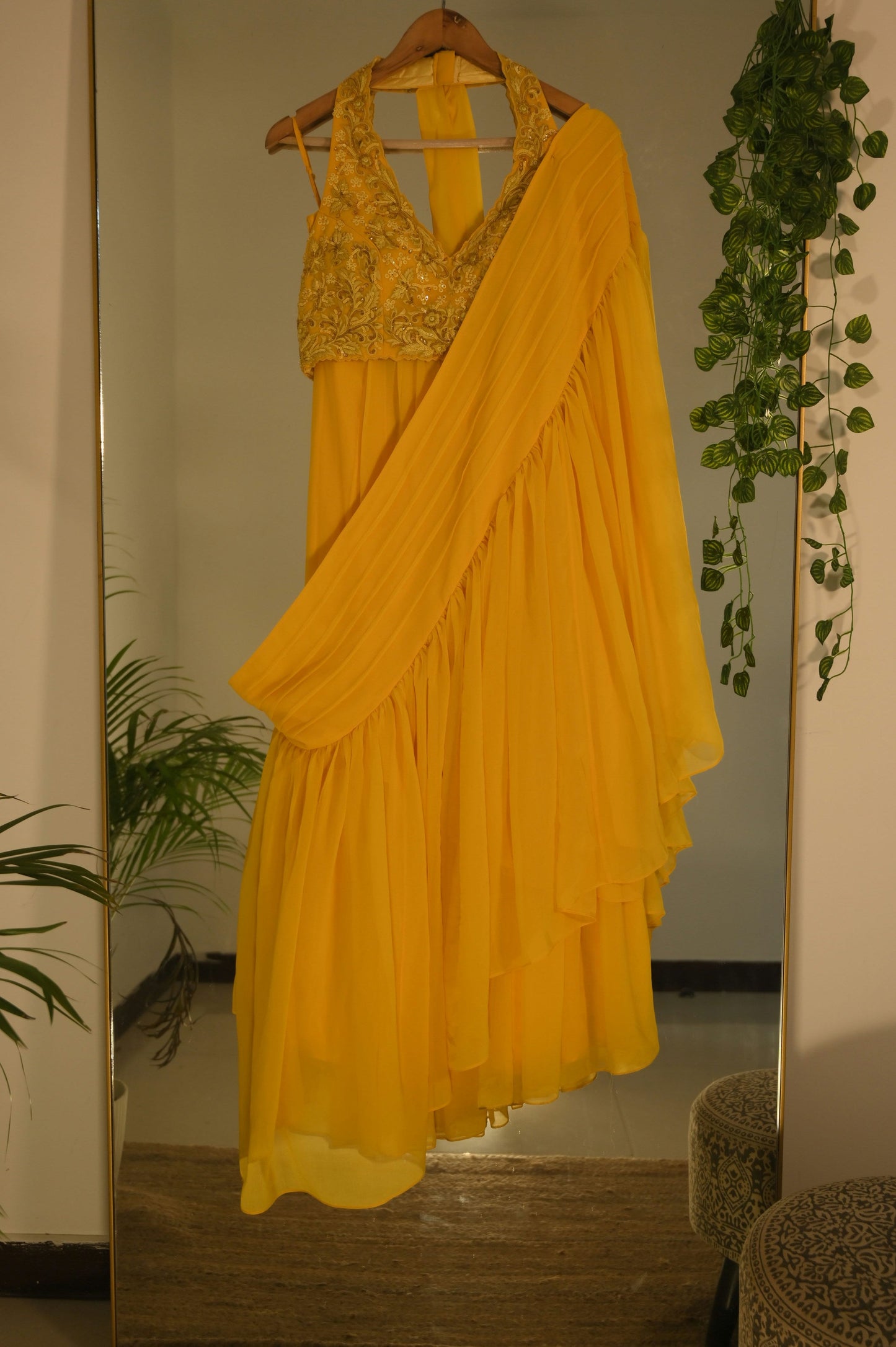 Yelllow Draped Saree with Halterneck Embellished Blouse