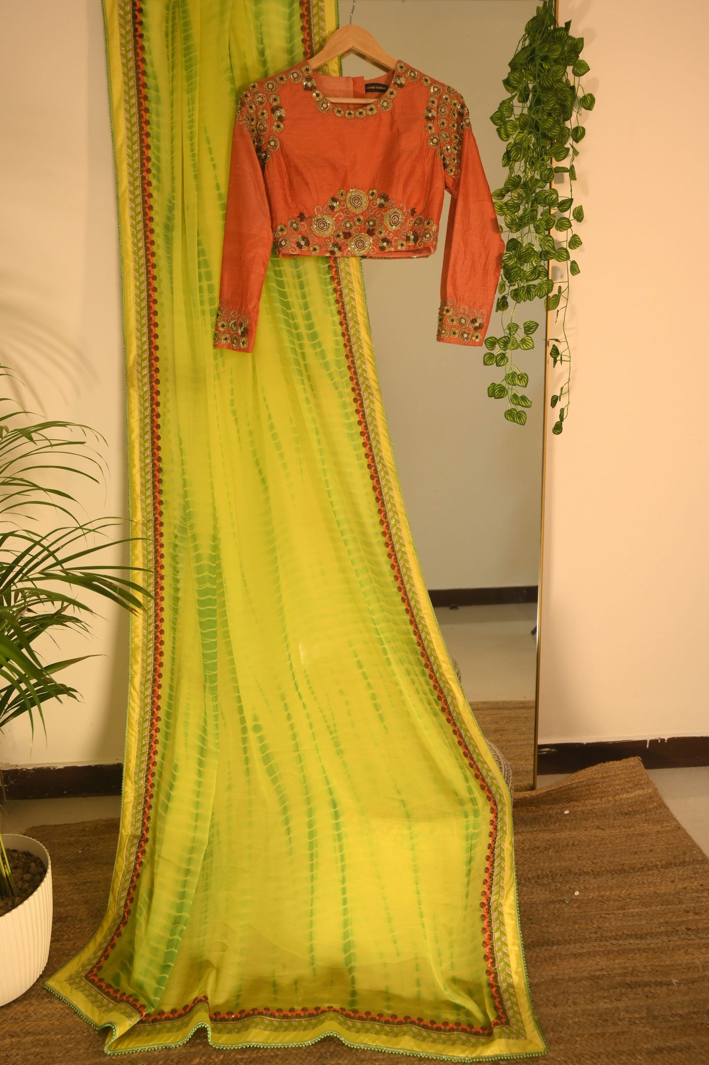 Yellow Tye Dye Saree with Embroidered Peach Blouse