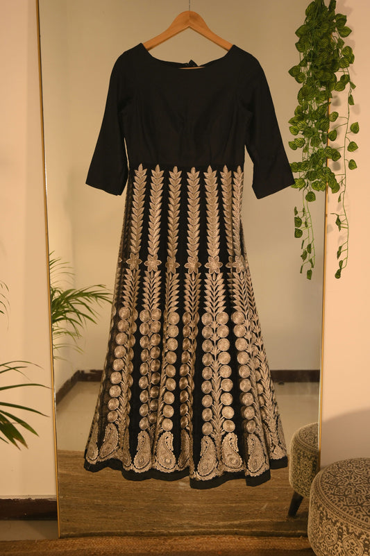 Black gown with golden threadwork