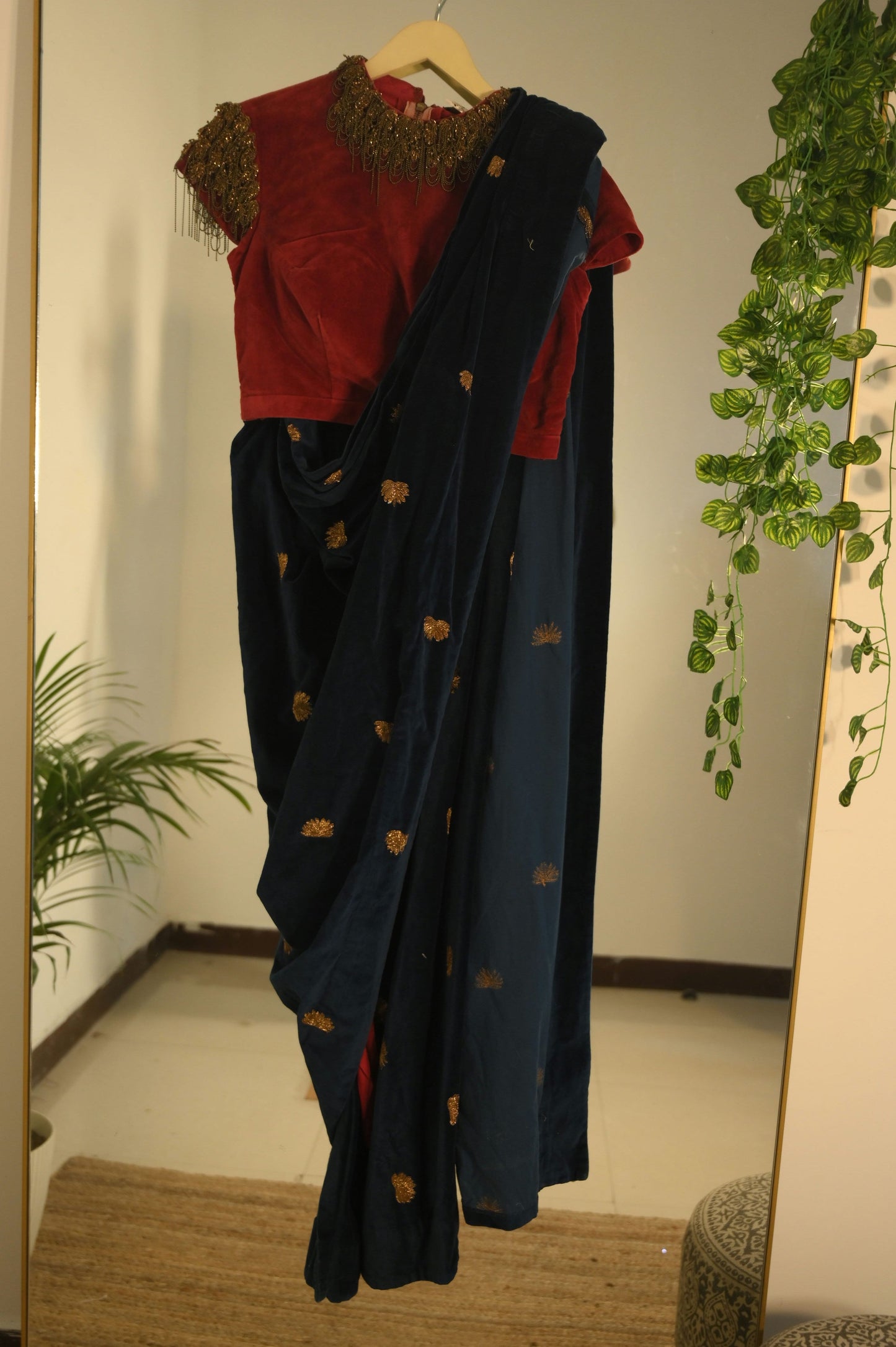 Embellished velvet blouse with navy Saree